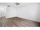 Spacious living room with hardwood flooring, neutral color, and ceiling fan at 6703 Gallant Se Ct, Mableton, GA 30126