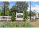 Community sign for Parkview Commons with manicured landscaping and a white fence at 6703 Gallant Se Ct, Mableton, GA 30126