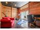 Exercise room in rustic-style home with treadmill and yoga mat on tile flooring at 725 Links View Dr, Sugar Hill, GA 30518