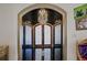 Grand foyer featuring black marble tile, and a decorative medallion at 725 Links View Dr, Sugar Hill, GA 30518