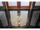 Detailed, artistic medallion inlay on the black marble tile floor at 725 Links View Dr, Sugar Hill, GA 30518
