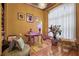 Features an ornate desk, large window, and hardwood floors at 725 Links View Dr, Sugar Hill, GA 30518