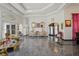 Expansive living room featuring marble floors and elegant decor at 725 Links View Dr, Sugar Hill, GA 30518