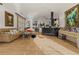 Features hardwood floors, comfortable sofas, and an open floor plan at 725 Links View Dr, Sugar Hill, GA 30518