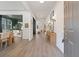 Spacious foyer with hardwood floors and views into the dining and living areas at 1840 Wellston Dr, Lawrenceville, GA 30043