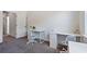 Bright home office featuring two white desks, perfect for a productive workspace with modern minimalist design at 1840 Wellston Dr, Lawrenceville, GA 30043