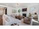 Spacious living room boasts a fireplace, stylish decor, and natural light, creating a warm and inviting space at 1840 Wellston Dr, Lawrenceville, GA 30043