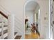Inviting foyer showcasing elegant archway, hardwood floors, and detailed trim at 2000 Old Dominion Rd, Atlanta, GA 30350