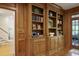 Charming living room featuring built-in bookshelves and french doors to outdoor patio at 2000 Old Dominion Rd, Atlanta, GA 30350