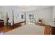 Serene main bedroom with a four-poster bed, hardwood floors, and plenty of natural light at 2000 Old Dominion Rd, Atlanta, GA 30350