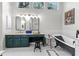 Bright bathroom featuring a clawfoot tub, double vanity, and large windows at 2518 Oakwood Se Way, Smyrna, GA 30080