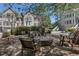 Exterior view of common area with seating and landscaping provides a community gathering space at 2518 Oakwood Se Way, Smyrna, GA 30080