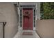 Inviting front door adorned with a wreath, complemented by sidelights and a welcome mat at 2518 Oakwood Se Way, Smyrna, GA 30080