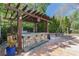 Outdoor kitchen with stone bar and grill is perfect for entertaining at 2518 Oakwood Se Way, Smyrna, GA 30080