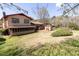 Backyard featuring a screened-in porch and storage shed at 3670 Whirlaway Dr, Decatur, GA 30034