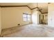Spacious bedroom with vaulted ceiling, window, and en-suite vanity at 3670 Whirlaway Dr, Decatur, GA 30034