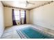 Bedroom featuring carpet floors, curtains, a ceiling fan, and natural light at 3670 Whirlaway Dr, Decatur, GA 30034