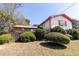 Angled exterior of the home with lush landscaping at 3670 Whirlaway Dr, Decatur, GA 30034