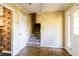 Foyer featuring a staircase, mosaic tile flooring, a chandelier, and natural light at 3670 Whirlaway Dr, Decatur, GA 30034