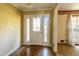 Entryway featuring a decorative glass door and chandelier lighting at 3670 Whirlaway Dr, Decatur, GA 30034