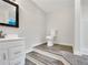 Bathroom with a modern vanity and tiled floor at 7240 Raintree Loop, Jonesboro, GA 30236