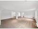 Spacious living room with recessed lighting and neutral carpeting at 7240 Raintree Loop, Jonesboro, GA 30236