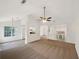 Spacious living room showcasing high ceilings, and modern finishes at 7240 Raintree Loop, Jonesboro, GA 30236