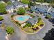 Aerial view showcasing a community pool, lounge chairs, and manicured landscaping at 108 Vinings Forest Se Cir, Smyrna, GA 30080