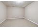 Unfinished basement offering a blank canvas for customization with neutral-toned walls and carpet flooring at 4310 Wellbrook Ct, Douglasville, GA 30135