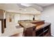 Basement featuring a bar area with seating and a pool table under recessed lighting at 4310 Wellbrook Ct, Douglasville, GA 30135