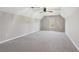 Spacious carpeted bedroom featuring vaulted ceilings, a ceiling fan, and a window at 4310 Wellbrook Ct, Douglasville, GA 30135