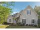 Well-manicured lawn and landscaping highlight this two-story home, creating a welcoming curb appeal at 4310 Wellbrook Ct, Douglasville, GA 30135