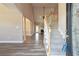 Grand foyer with hardwood floors, staircase, and an open floor plan leading to the living areas at 4310 Wellbrook Ct, Douglasville, GA 30135