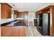 Kitchen featuring dark countertops, wooden cabinets and stainless steel appliances at 4310 Wellbrook Ct, Douglasville, GA 30135