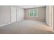 Additional room with carpet, a closet door, and a bright window at 4310 Wellbrook Ct, Douglasville, GA 30135