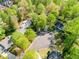 Aerial view showcasing homes nestled within a lush, tree-filled neighborhood at 1226 Haven Brook Ne Way, Brookhaven, GA 30319