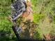 Aerial view of home featuring a backyard with deck and fire pit at 1226 Haven Brook Ne Way, Brookhaven, GA 30319