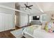 Bedroom with vaulted ceilings, hardwood flooring, and multiple closets at 1226 Haven Brook Ne Way, Brookhaven, GA 30319