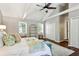 Bedroom with hardwood flooring, two windows, and shelving unit at 1226 Haven Brook Ne Way, Brookhaven, GA 30319
