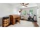 Office with vintage desk, Peloton, and overhead lighting at 1226 Haven Brook Ne Way, Brookhaven, GA 30319