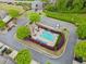 Aerial view of a community pool featuring clear blue water, lounge chairs, and manicured landscaping at 1902 Glen Ivy, Marietta, GA 30062
