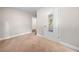 Bright and spacious bonus room with plush carpet and a convenient door to a mirror, versatile for any need at 1902 Glen Ivy, Marietta, GA 30062