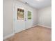 Versatile carpeted bonus room with french doors, natural light, and clean design, ready for personalization at 1902 Glen Ivy, Marietta, GA 30062