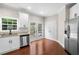 Kitchen with stainless steel appliances and white cabinetry looking toward the double doors at 1902 Glen Ivy, Marietta, GA 30062