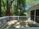 Relax on this beautiful wood deck, perfect for enjoying nature and outdoor living at 5245 Cherry Hill Ln, Powder Springs, GA 30127