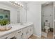 Bathroom with white cabinetry, and neutral tile at 5245 Cherry Hill Ln, Powder Springs, GA 30127
