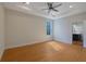 Bedroom boasts hardwood floors, recessed lighting, and a tray ceiling at 553 Somersby Dr, Dallas, GA 30157