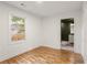 Bedroom with hardwood floors leads to an ensuite bathroom at 1144 Edie Se Ave, Atlanta, GA 30312