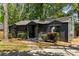 Stylish single-story home with a freshly painted exterior and lush green landscaping at 1144 Edie Se Ave, Atlanta, GA 30312