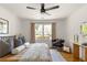 Stylish bedroom featuring a comfortable bed, hardwood floors, and natural light at 1144 Edie Se Ave, Atlanta, GA 30312